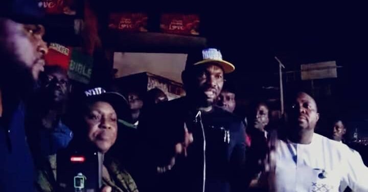 *Oredo council chair, Gabriel Iduseri at the burnt Oba market