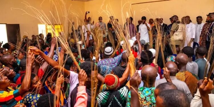 Some new members of the All Progressives Congress (APC) in  Ovia South-West LGA, Edo, on Saturday