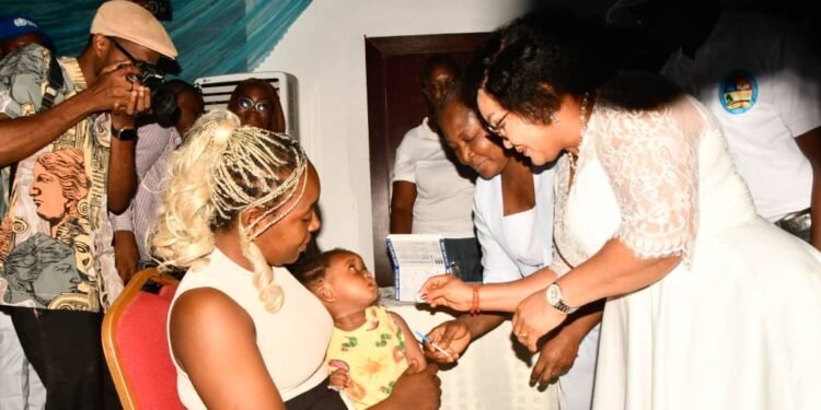 Wife of the the Delta State Deputy Governor, Ezinne Catherine Onyeme (7th left), who represented wife of the Governor, Deaconess Tobore Oborevwori, Secretary to the State Government, Dr. Kingsley Emu (6th left), Head of Service, Dr. (Mrs.) Mininim Oseji (5th left), alongside other dignitaries and school children during the flag-off of the Measles-Rubella vaccination campaign in Government House, Asaba on Thursday. PIX: BRIPIN ENARUSAI