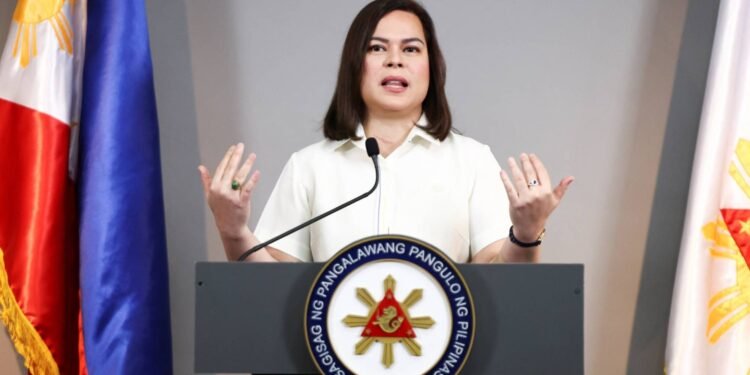 Philippine Vice President Sara Duterte delivers a statement following her impeachment by the lower house of the Congress, in her office at Mandaluyong City, Metro Manila, Philippines, February 7, 2025. REUTERS/Eloisa Lopez