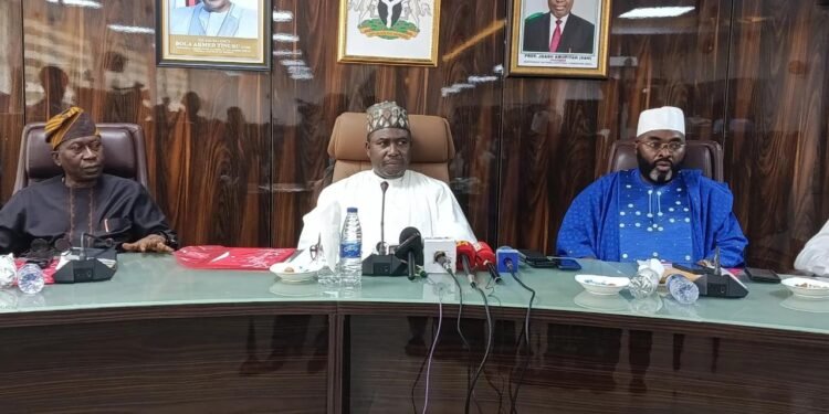 INEc Chairman, Prof Joash Amupitan (m) and other members of the electoral commission