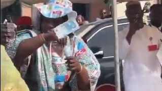 Outrage as Nigerians React to Video of APC Member Spraying Naira During Tinubu’s Adamawa Visit (Video)