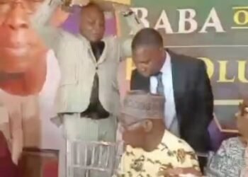 Charly Boy Seen Carrying Huge Box on His Head to Gift Obasanjo at His 89th Birthday Party (Video)