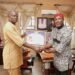 *Ven. Dr Ferguson Ezeokafor, the new Deputy Rector, Fed Poly Oko, being honoured by the Alumni President, Nze Henry Nnebe during the courtesy visit