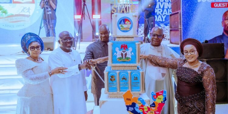 *8680: From left: Wife of the Delta State Governor, Deaconess Tobore Oborevwori; Governor of Delta State, Rt. Hon. Sheriff Oborevwori; renowned cleric, Apostle Joshua Selman; Deputy Governor of Delta State, Sir Monday Onyeme; and his wife, Lady Catherine Onyeme, during the cutting of the cake to commemorate Governor Oborevwori’s third year anniversary in office and the 2026 Delta State Thanksgiving and Praise Day held in Asaba on Friday. Photo: Samuel Jibunor.