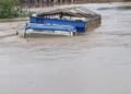 Flooding Submerges Collapsed Kwara Bridge, Traps Commuters