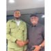 *Hon. Collins Edomaruse (r) in a warm handshake with the corps medical doctor, Chinedu Emmanuel (Photo: Ogochukwu Isioma)