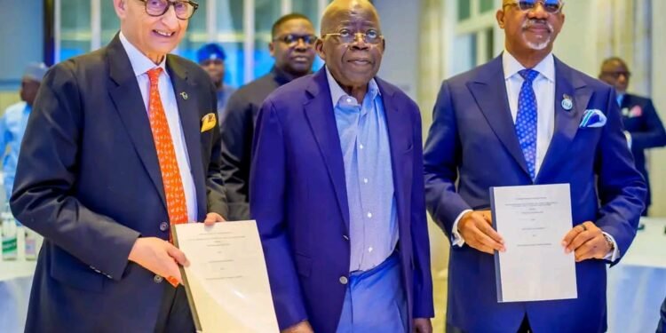 President Bola Tinubu (m), Gov Dapo Abiodun of Ogun (r), and official of DP World (l) after the MoU signing ceremony in Paris, France