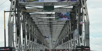 Umahi Reopens First Niger Bridge Adorned with Tinubu’s Pictures